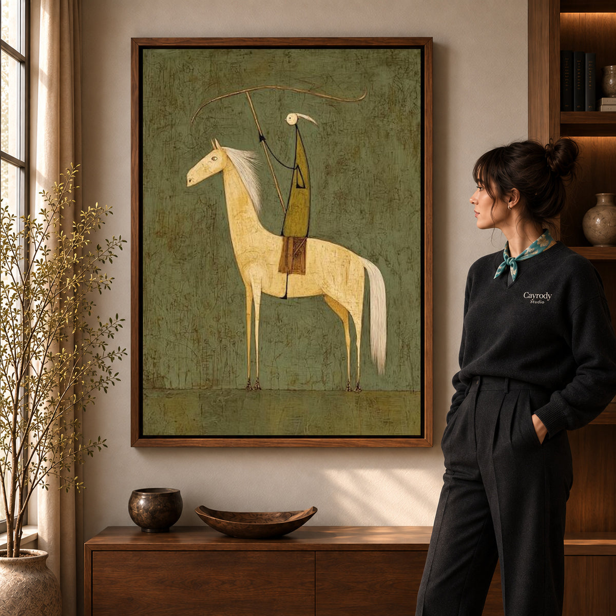 quiet lasso rider canvas art shown in the walnut frame option within a warm living room.
