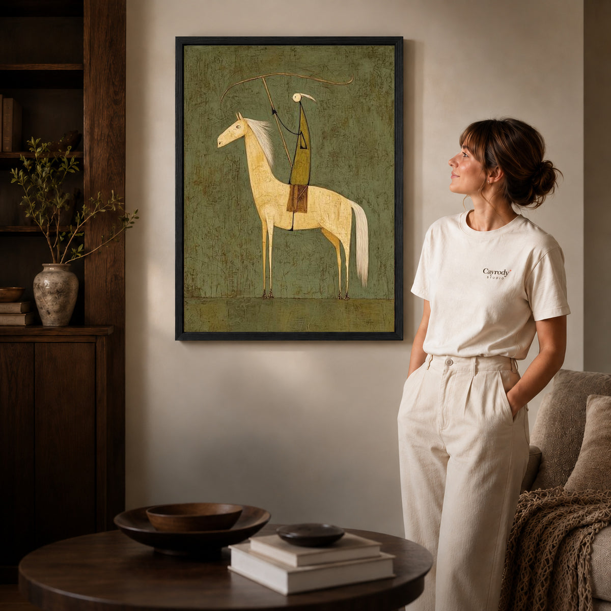 quiet lasso rider canvas art shown in the black frame option against a softly lit wall.