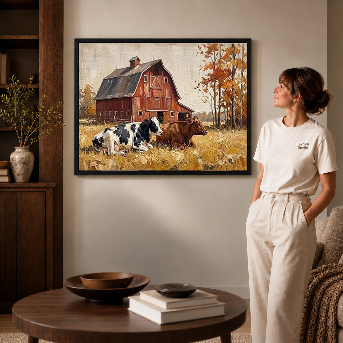 red barn companions canvas art shown in the black frame option against a softly lit wall.