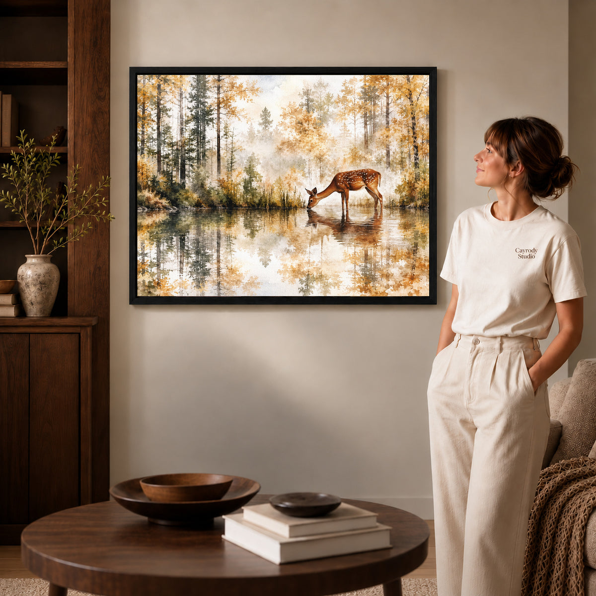 quiet woodland deer canvas art shown in the black frame option against a softly lit wall.