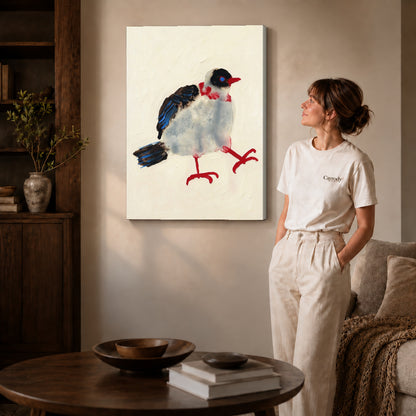 playful stepping bird canvas art on gallery-wrapped canvas with natural edge shading beside a standing woman.