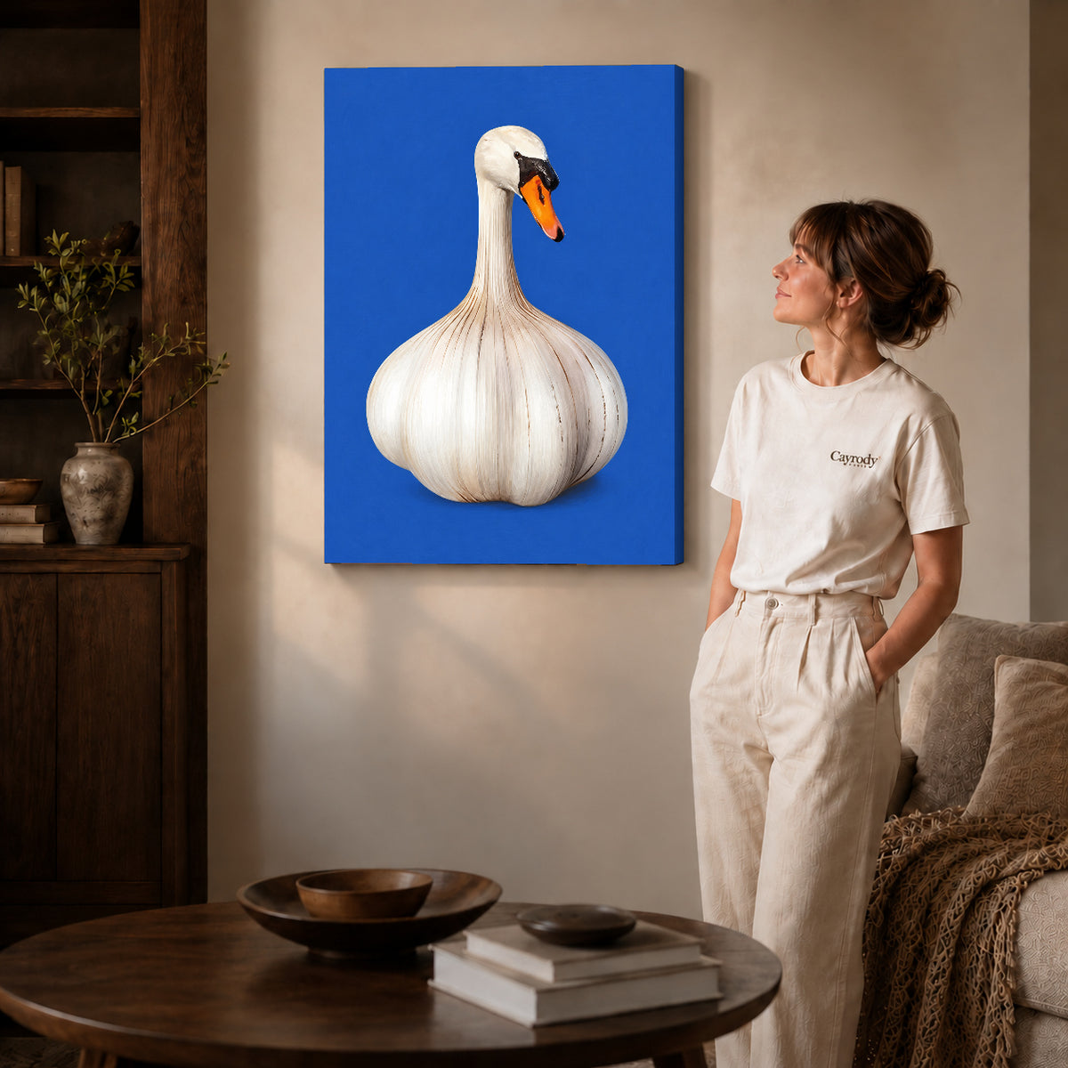 whimsical garlic swan canvas art shown in the gallery-wrapped option with visible depth and warm surroundings.