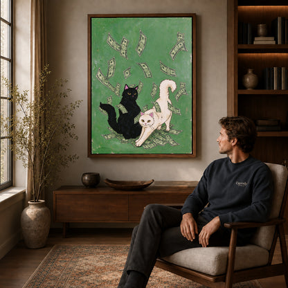 lucky cat gathering canvas art in a walnut frame above a console beside a seated man.