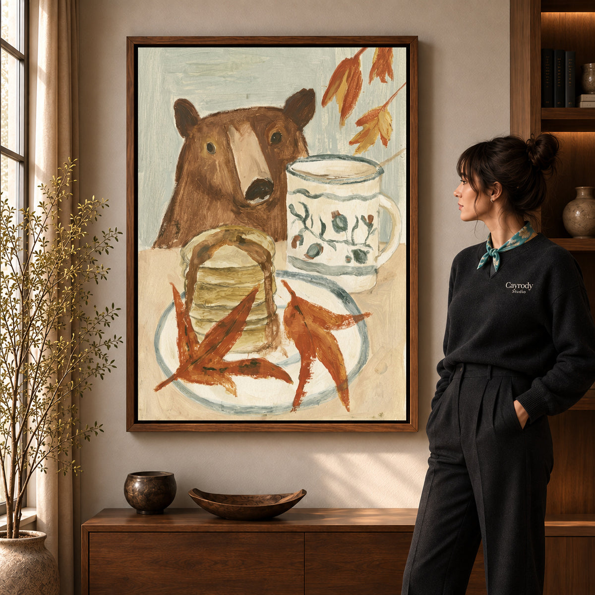 breakfast bear companion canvas art shown in the walnut frame option within a warm living room.