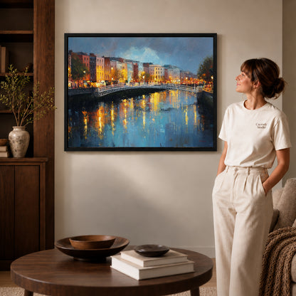 city bridge reflections canvas art in a black frame beside a woman and round wooden table.