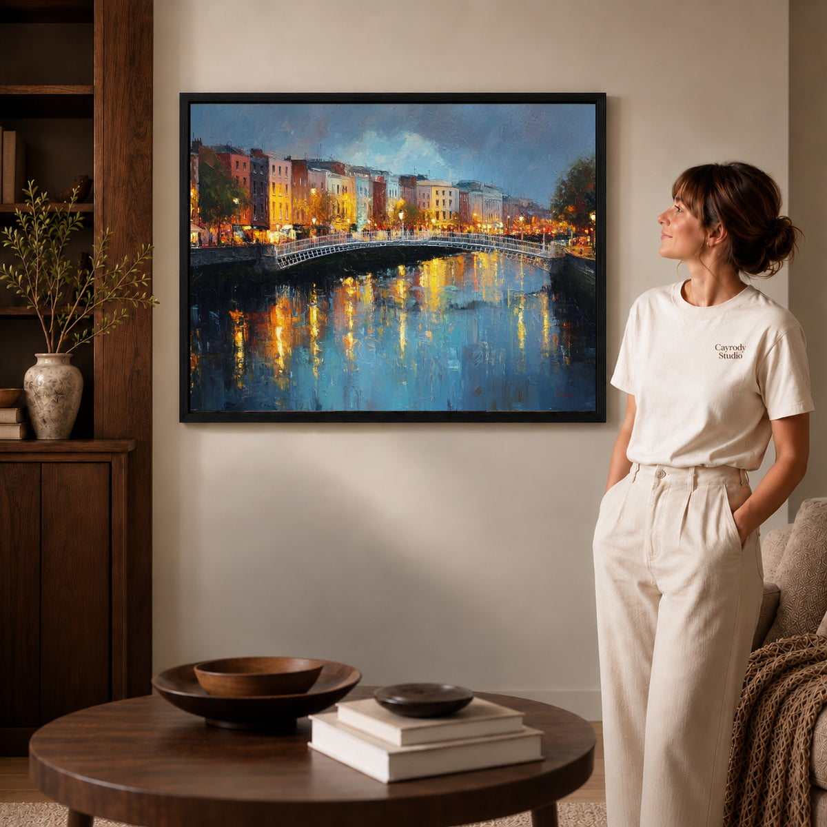 city bridge reflections canvas art shown in the black frame option against a softly lit wall.