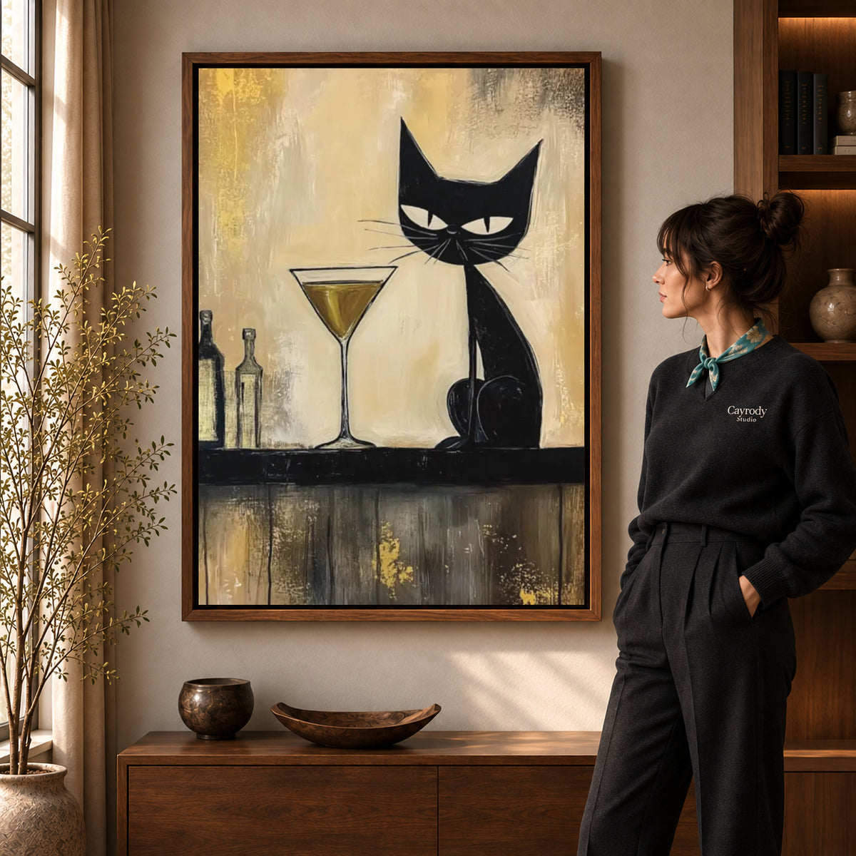 midnight martini cat canvas art shown in the walnut frame option within a warm living room.
