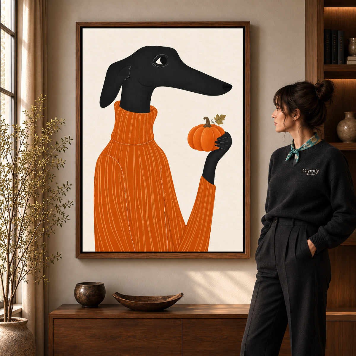 pumpkin sweater dachshund canvas art shown in the walnut frame option within a warm living room.
