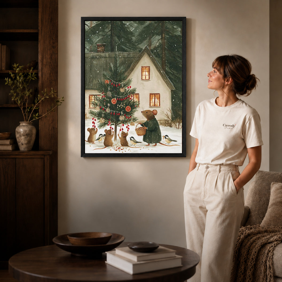 woodland christmas canvas art shown in the black frame option against a softly lit wall.
