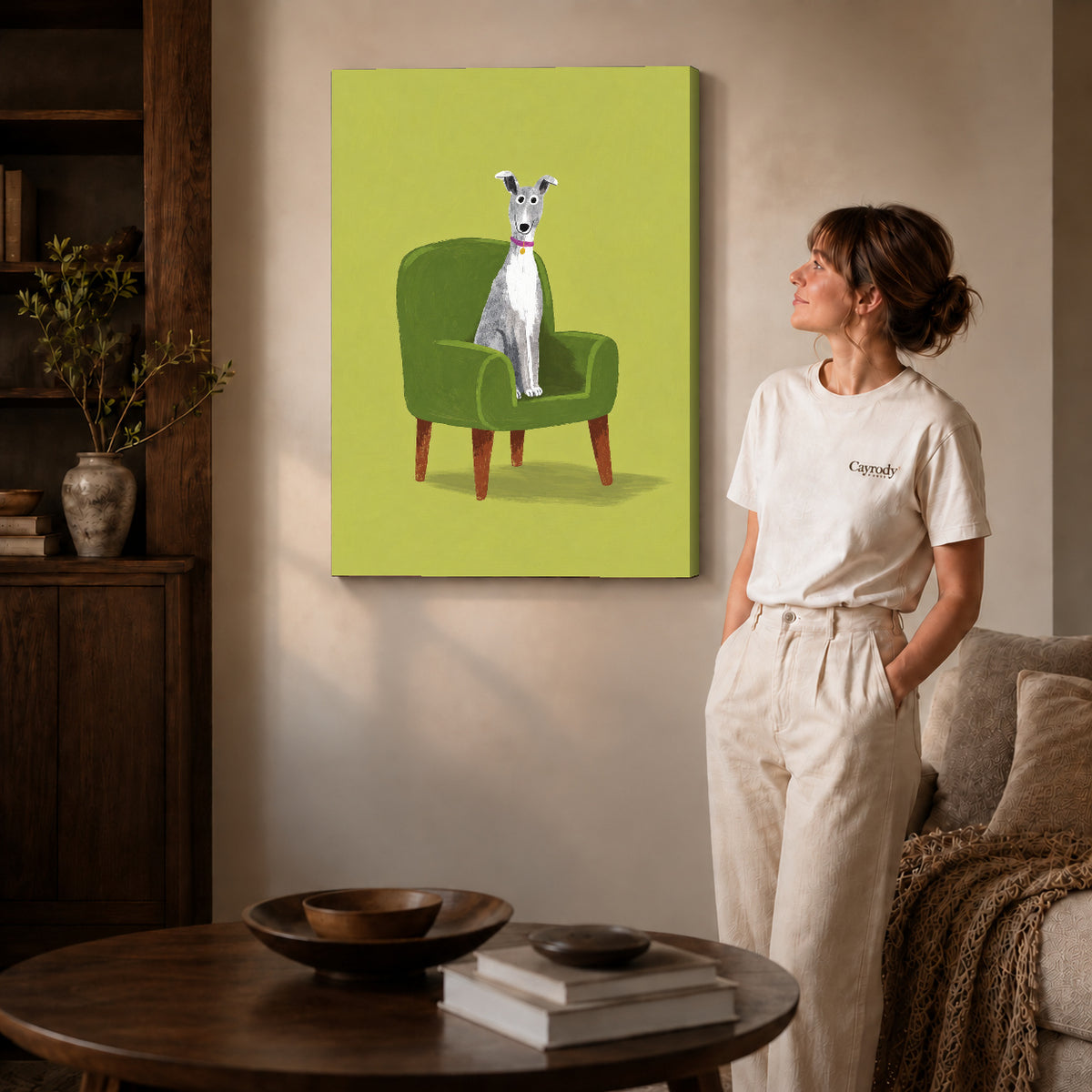 whippet favorite chair canvas art on gallery-wrapped canvas with natural edge shading beside a standing woman.