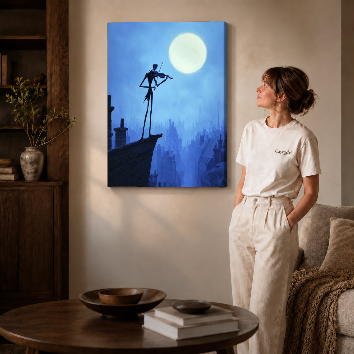 moonlit rooftop violin canvas art on gallery-wrapped canvas with natural edge shading beside a standing woman.