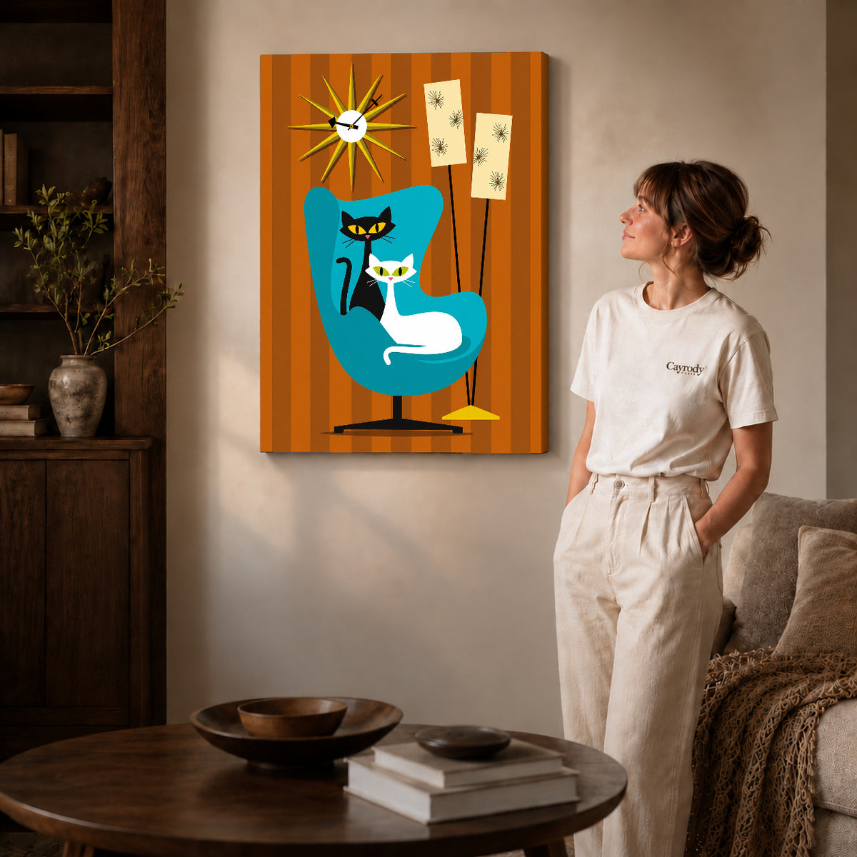 midcentury cat chair canvas art on gallery-wrapped canvas with natural edge shading beside a standing woman.