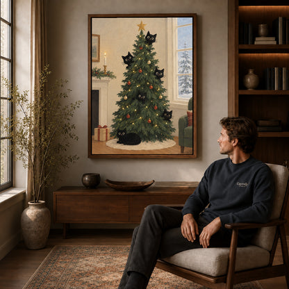 christmas tree cats canvas art in a walnut frame above a console beside a seated man.