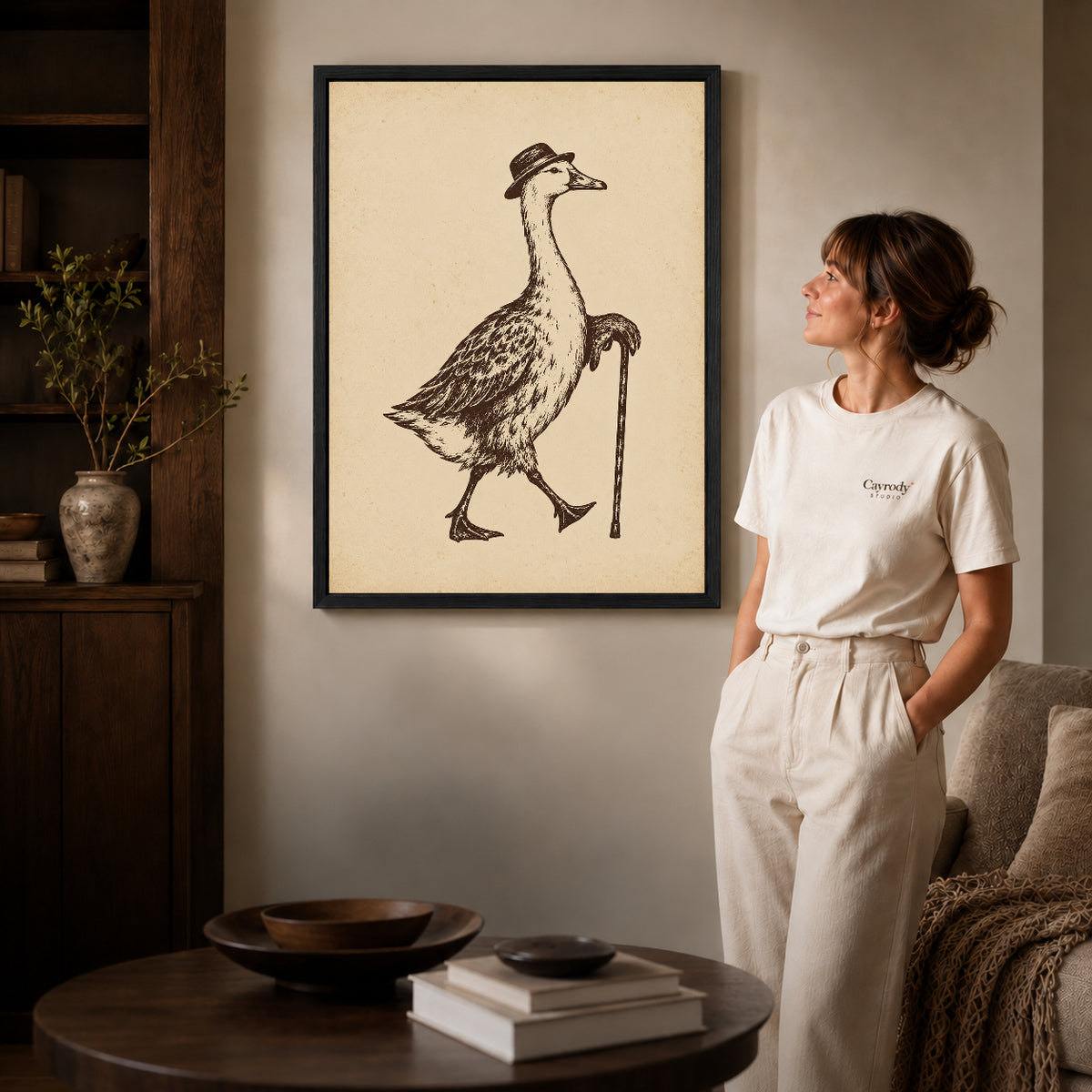 dapper goose stroll canvas art shown in the black frame option against a softly lit wall.