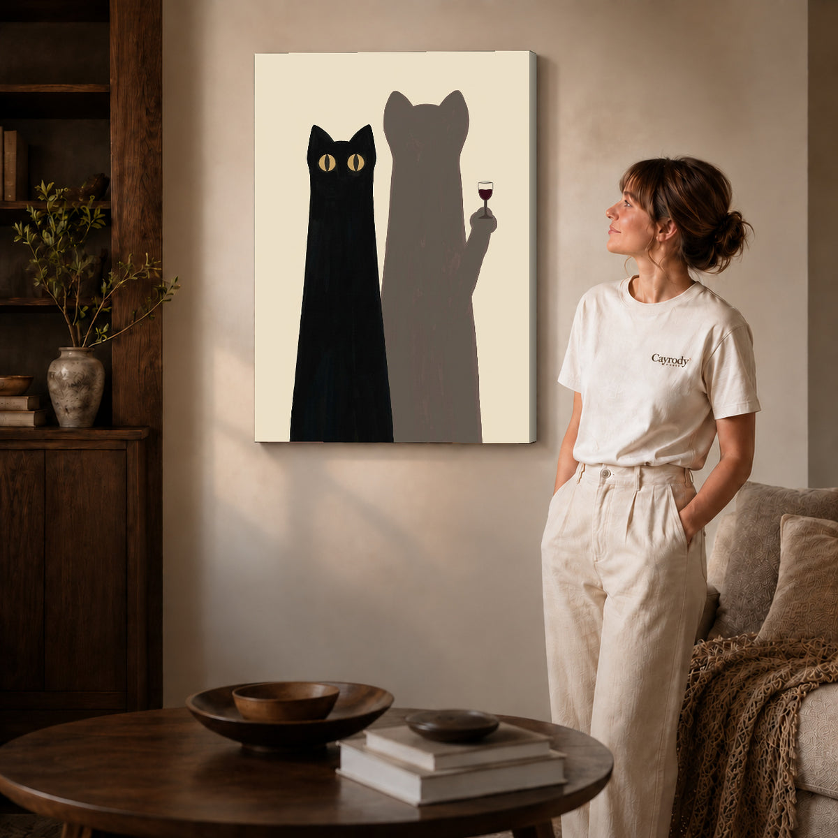 cat shadow toast canvas art on gallery-wrapped canvas with natural edge shading beside a standing woman.