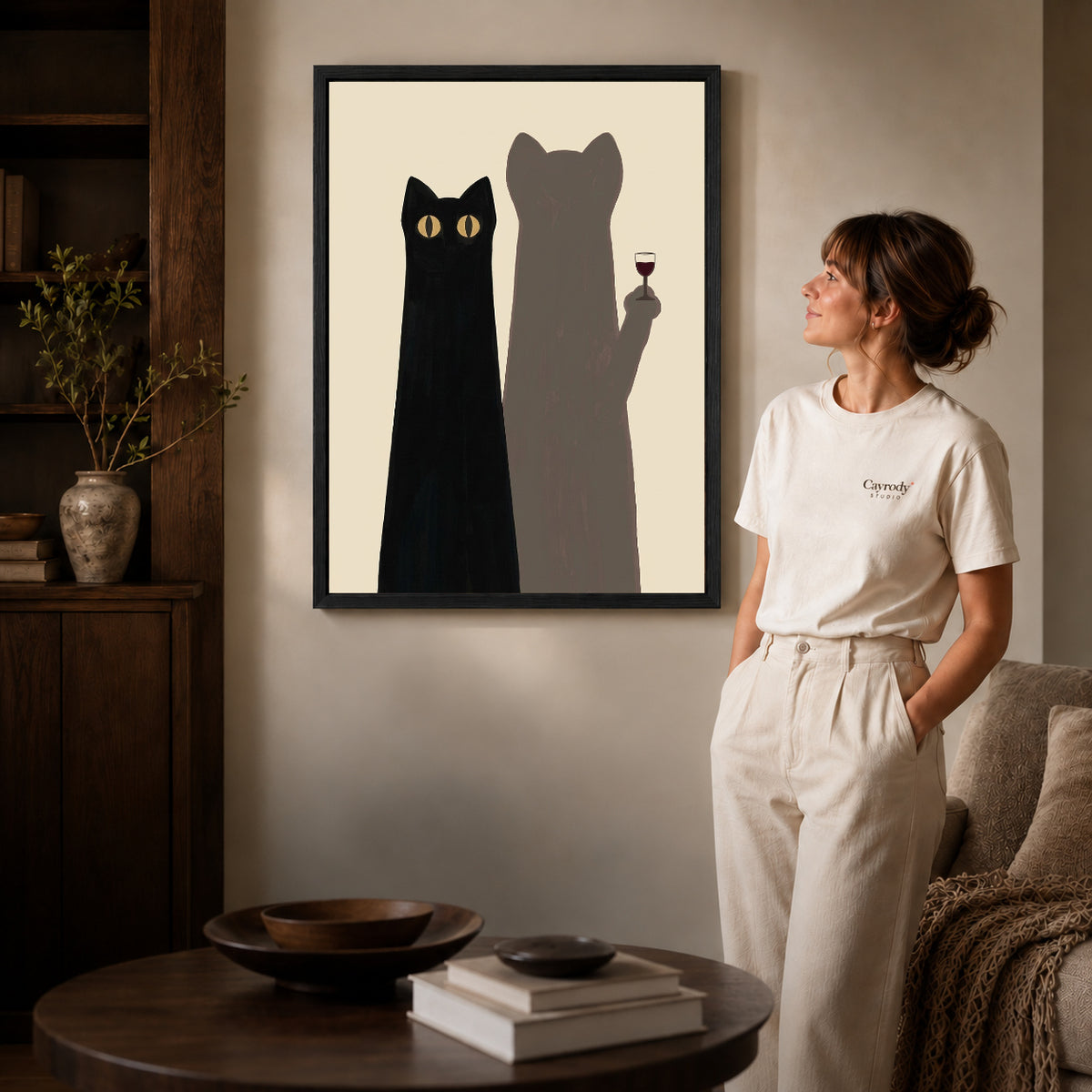 cat shadow toast canvas art shown in the black frame option against a softly lit wall.