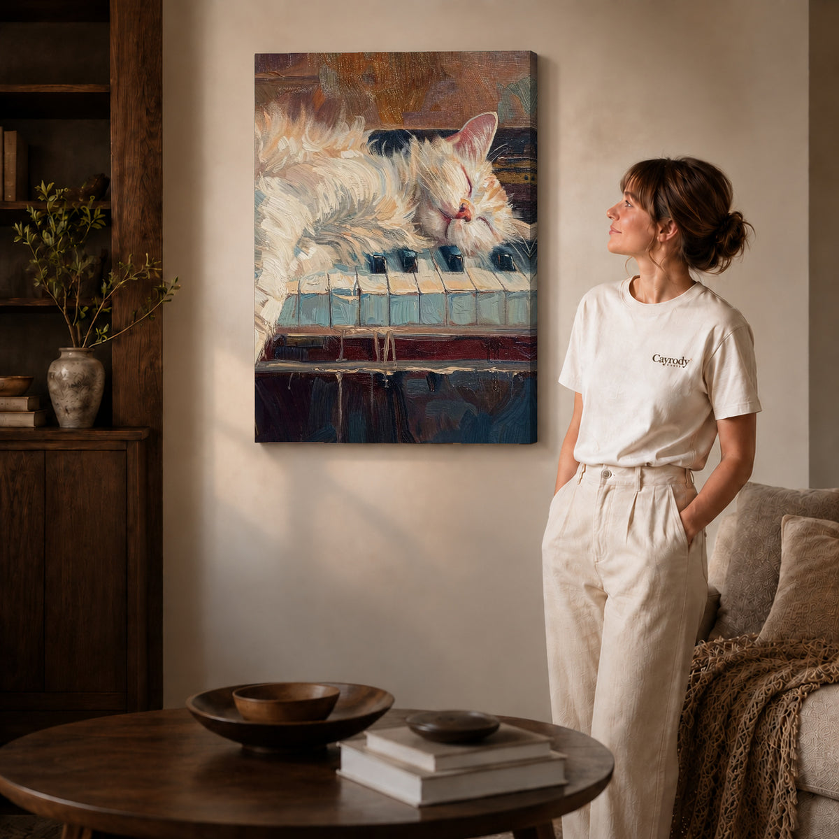 sleepy piano cat canvas art on gallery-wrapped canvas with natural edge shading beside a standing woman.