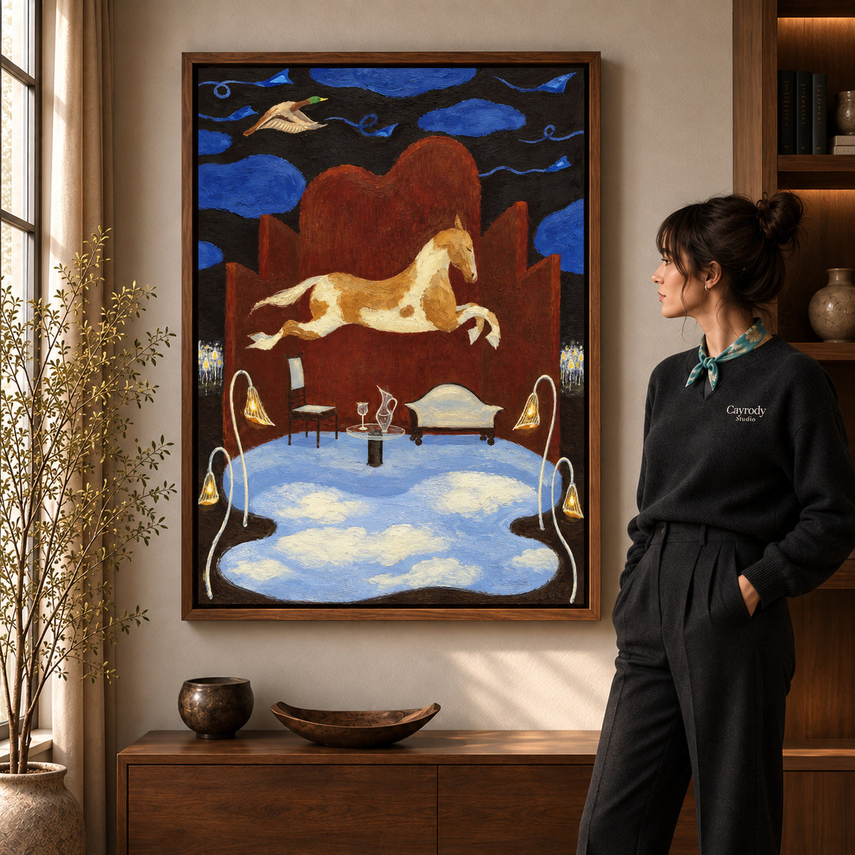 dreaming horse room canvas art in a walnut frame beside a standing woman and wooden console.