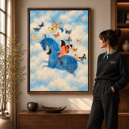 butterfly horse dream canvas art in a walnut frame beside a standing woman and wooden console.
