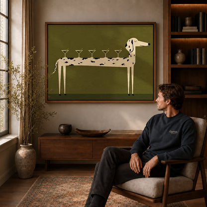 cocktail canine balance canvas art in a walnut frame above a console beside a seated man.