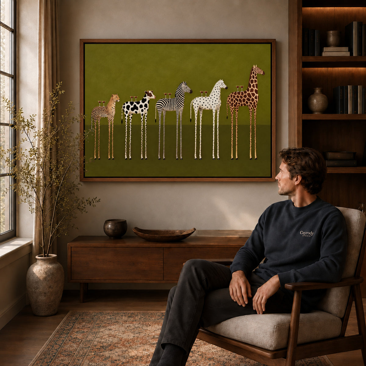cocktail animal parade canvas art in a walnut frame above a console beside a seated man.