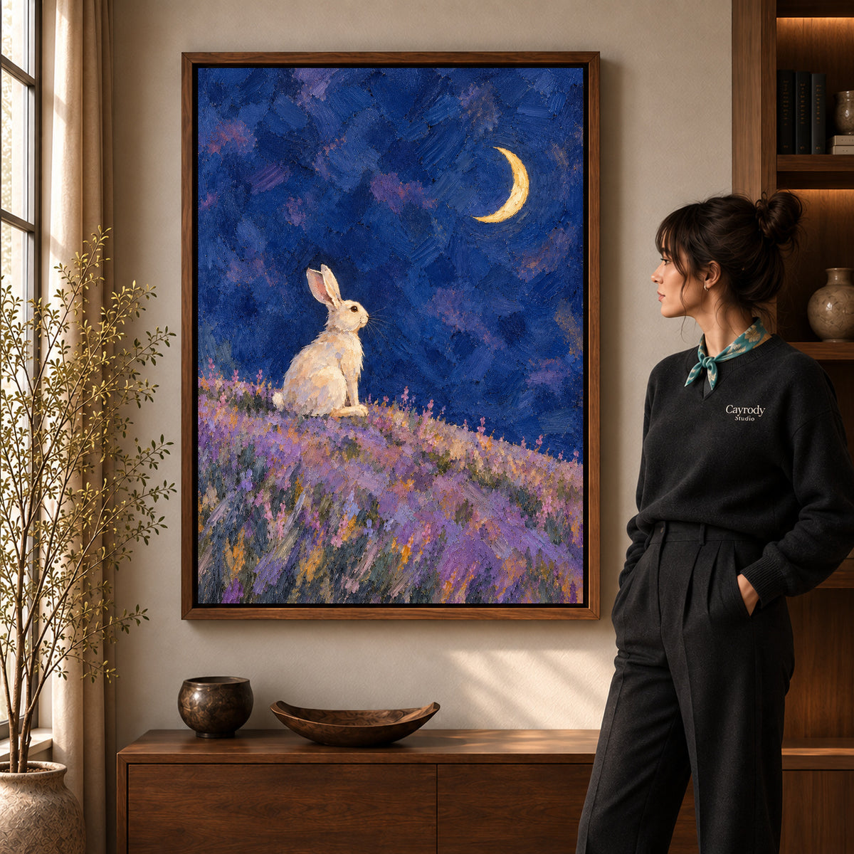 moonlit lavender rabbit canvas art shown in the walnut frame option within a warm living room.