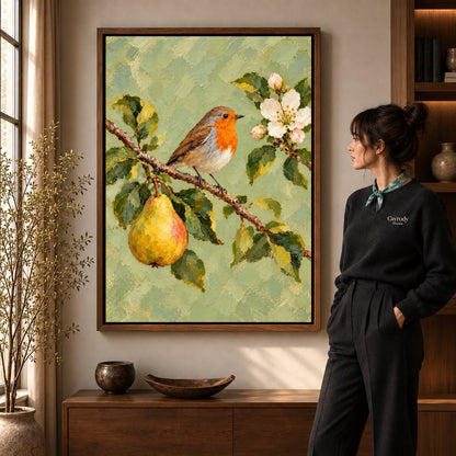 robin pear blossoms canvas art in a walnut frame beside a standing woman and wooden console.