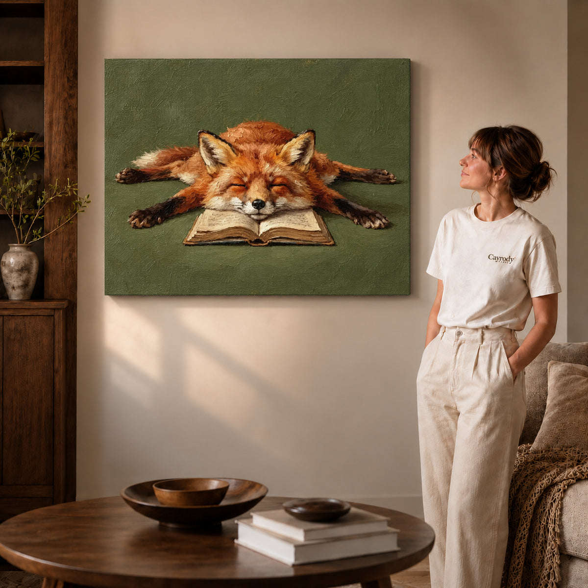 sleepy book fox canvas art on gallery-wrapped canvas with visible edge depth beside a standing woman.