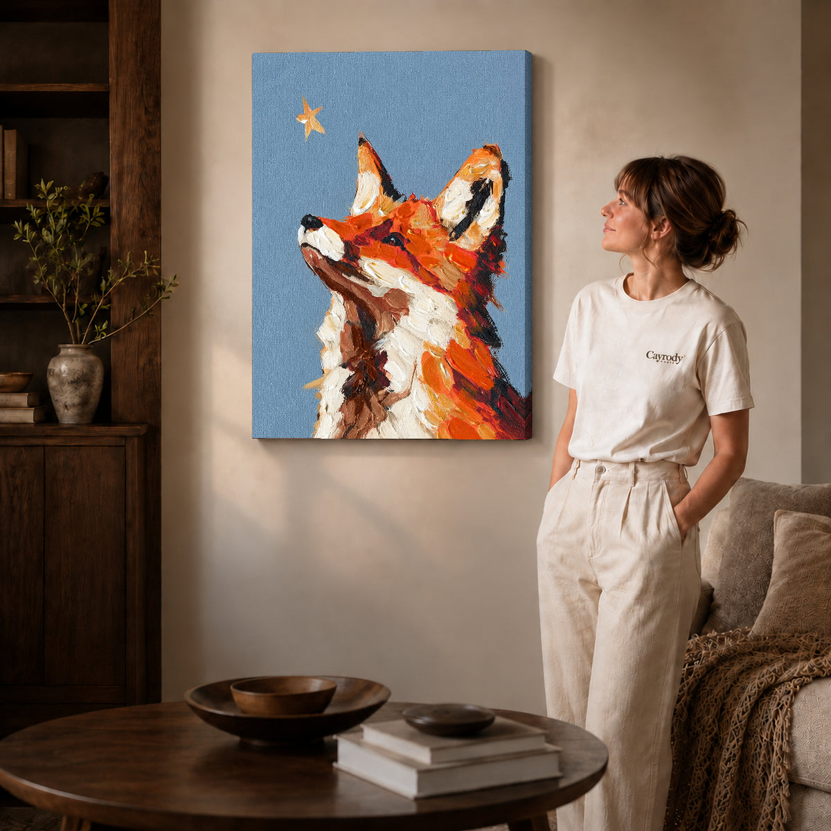 stargazing fox portrait canvas art on gallery-wrapped canvas with natural edge shading beside a standing woman.