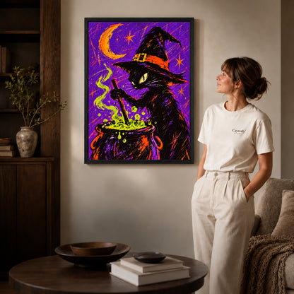 witch cat cauldron canvas art shown in the black frame option against a softly lit wall.