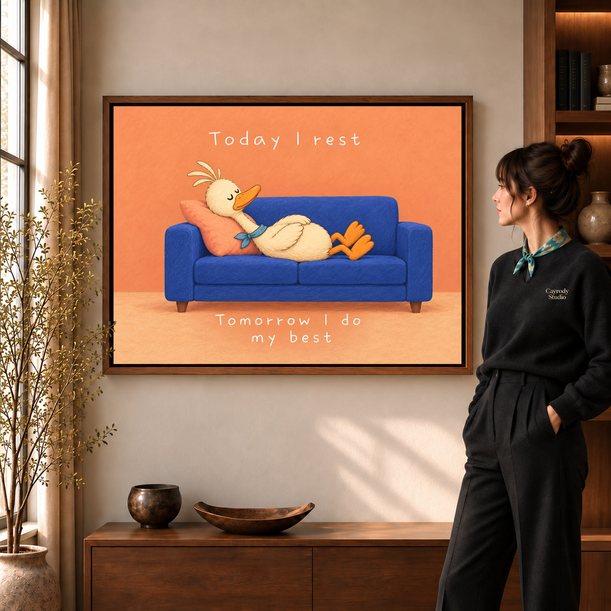 rest day duck canvas art shown in the walnut frame option within a warm living room.