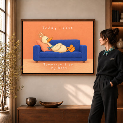 rest day duck canvas art shown in the walnut frame option within a warm living room.