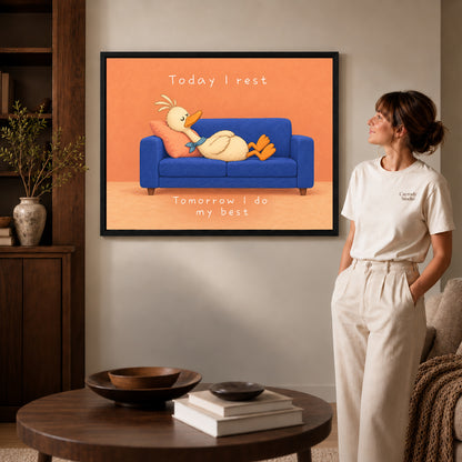 rest day duck canvas art shown in the black frame option against a softly lit wall.