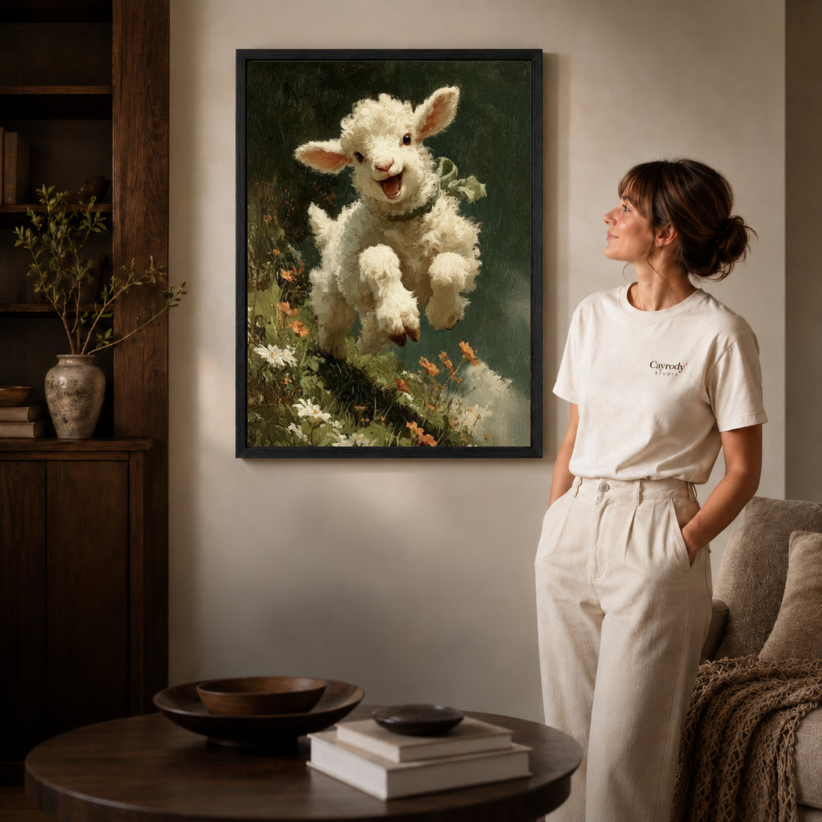joyful meadow lamb canvas art shown in the black frame option against a softly lit wall.