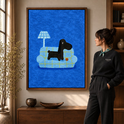 cozy plaid companion canvas art in a walnut frame beside a standing woman and wooden console.