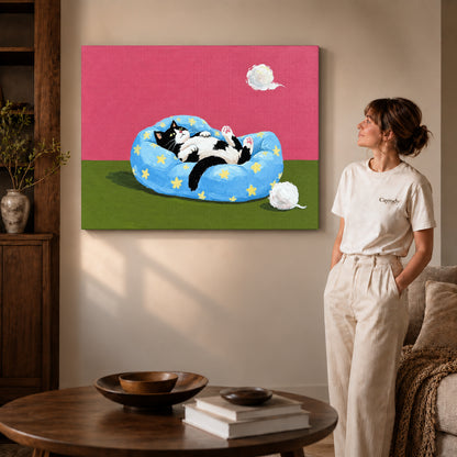 star bed cat canvas art on gallery-wrapped canvas with visible edge depth beside a standing woman.