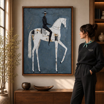 quiet equestrian poise canvas art in a walnut frame beside a standing woman and wooden console.
