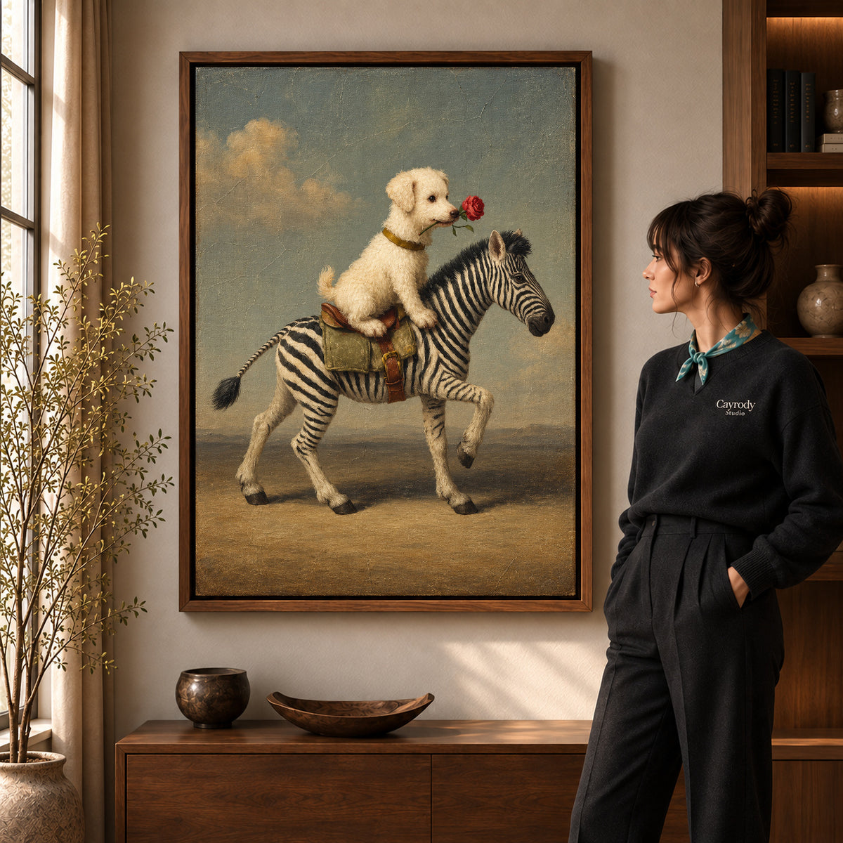 puppy zebra journey canvas art in a walnut frame beside a standing woman and wooden console.