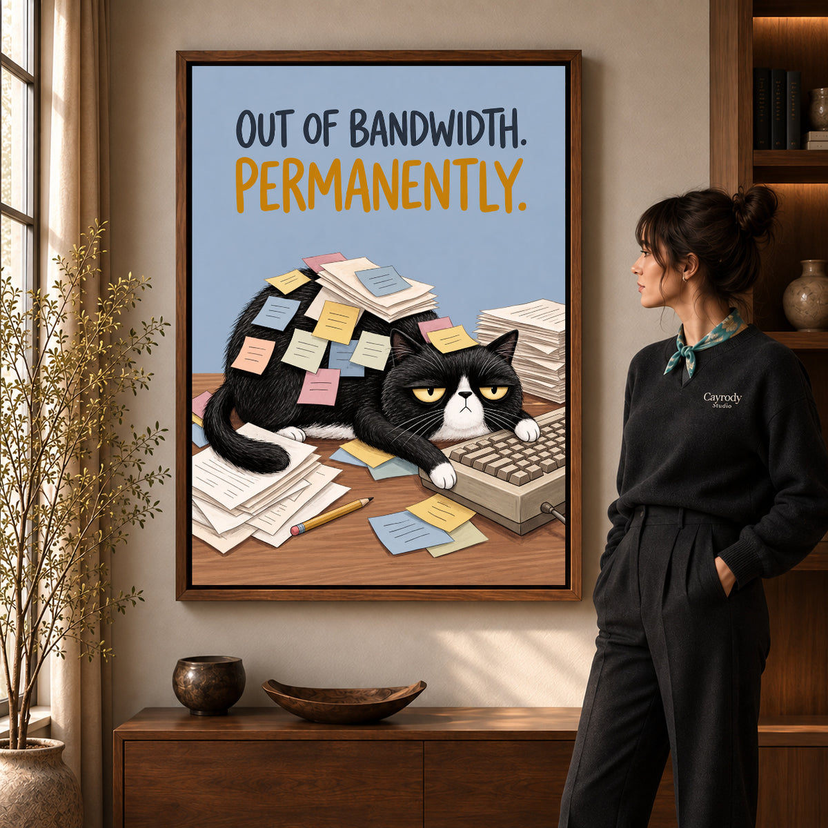 out of bandwidth canvas art shown in the walnut frame option within a warm living room.