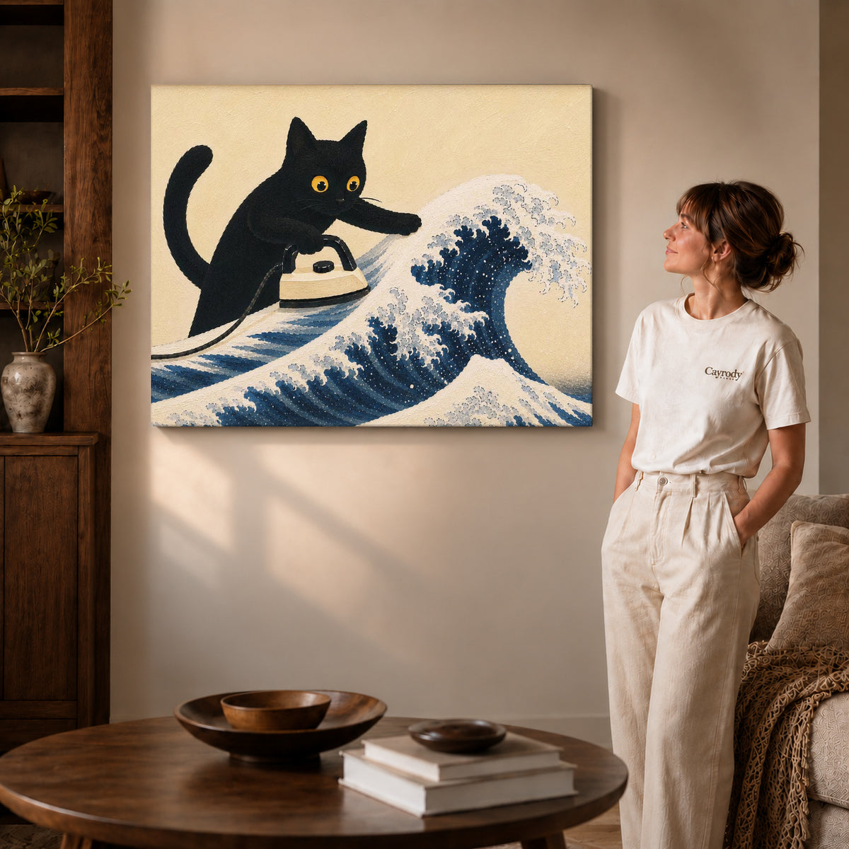 cat wave ironing canvas art on gallery-wrapped canvas with visible edge depth beside a standing woman.