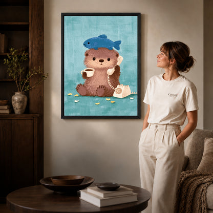 otter coffee call canvas art in a black frame beside a woman and round wooden table.