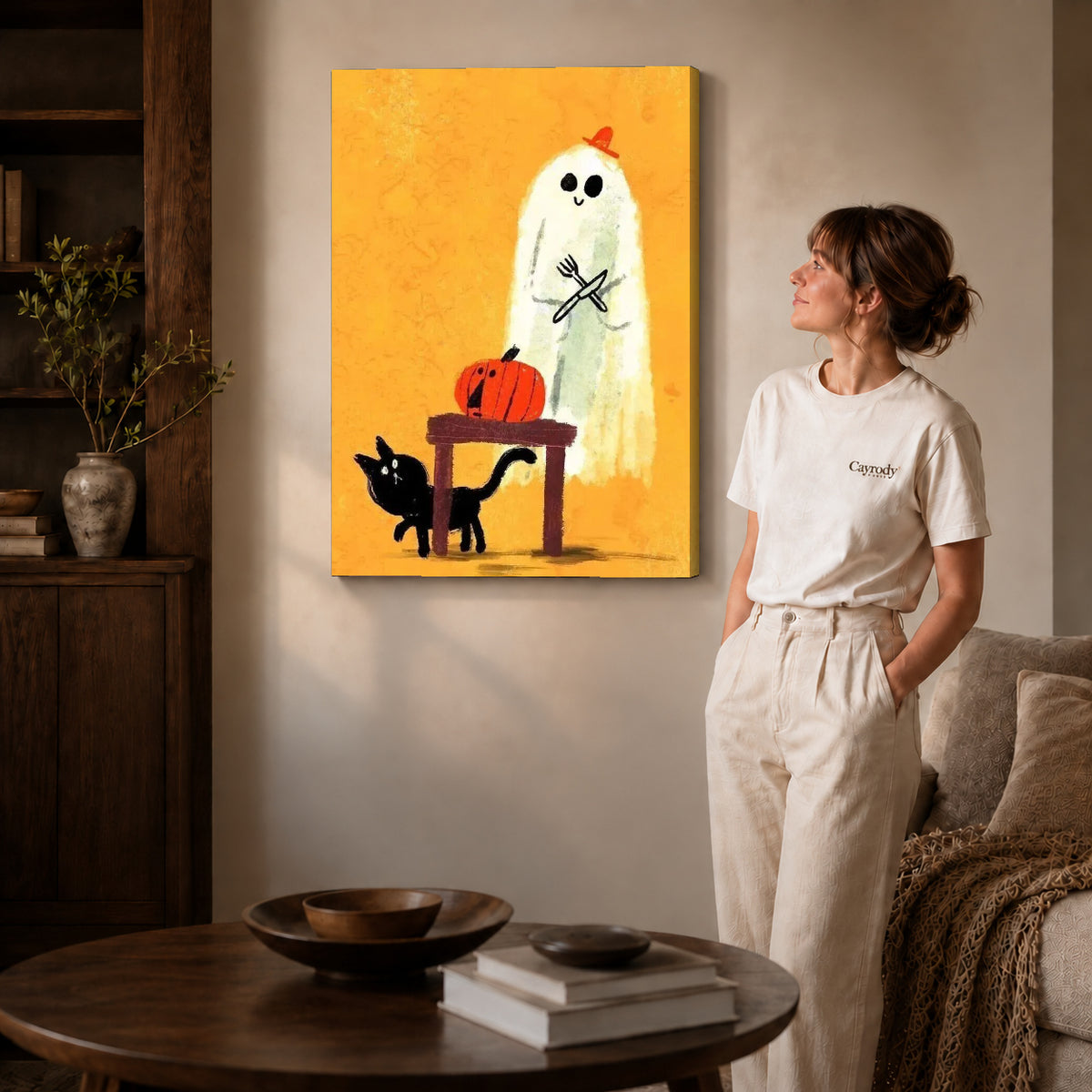 ghost dinner surprise canvas art on gallery-wrapped canvas with natural edge shading beside a standing woman.