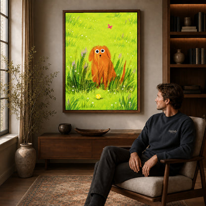 dog meadow daydream canvas art in a walnut frame above a console beside a seated man.