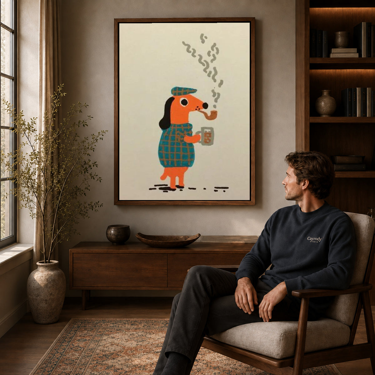 plaid pipe companion canvas art in a walnut frame above a console beside a seated man.