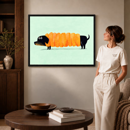 accordion dachshund canvas art in a black frame beside a woman and round wooden table.