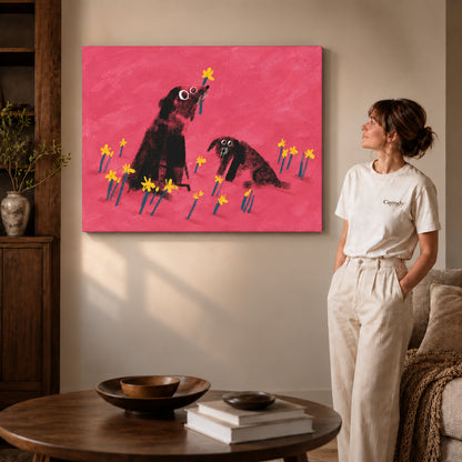 dogs among daffodils canvas art on gallery-wrapped canvas with visible edge depth beside a standing woman.