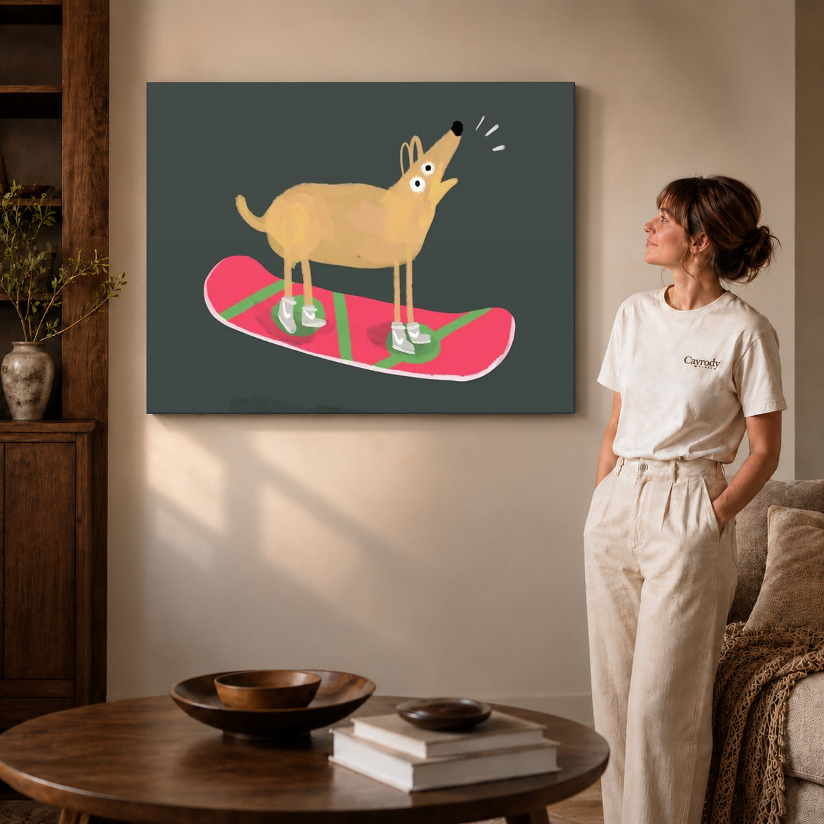 snowboard dog adventure canvas art on gallery-wrapped canvas with visible edge depth beside a standing woman.