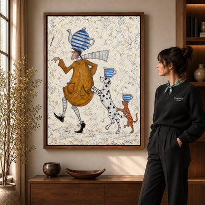 teacup walking parade canvas art shown in the walnut frame option within a warm living room.
