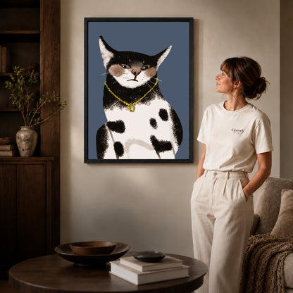 golden pendant cat canvas art shown in the black frame option against a softly lit wall.