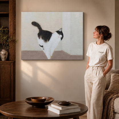 quiet cat stroll canvas art on gallery-wrapped canvas with visible edge depth beside a standing woman.